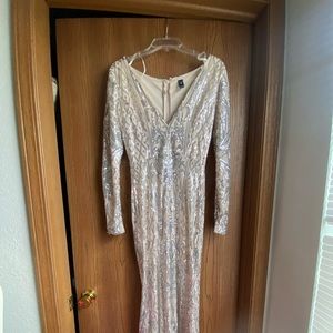 This was my 16th birthday dress. It’s formal, long with sleeves.